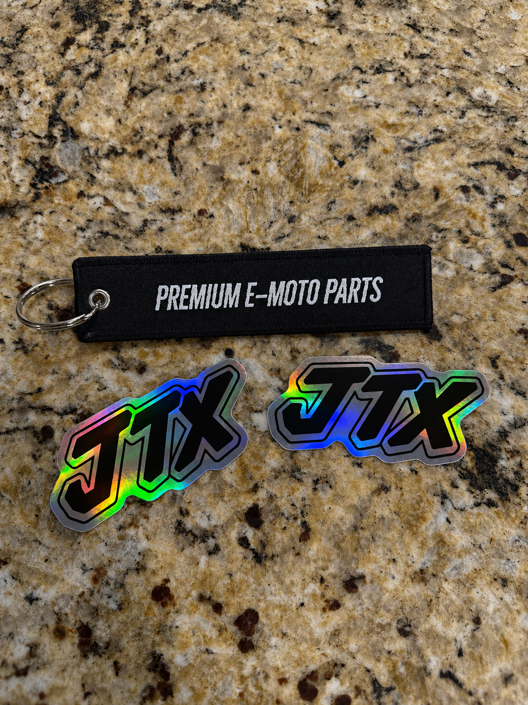 JTX keychain with stickers