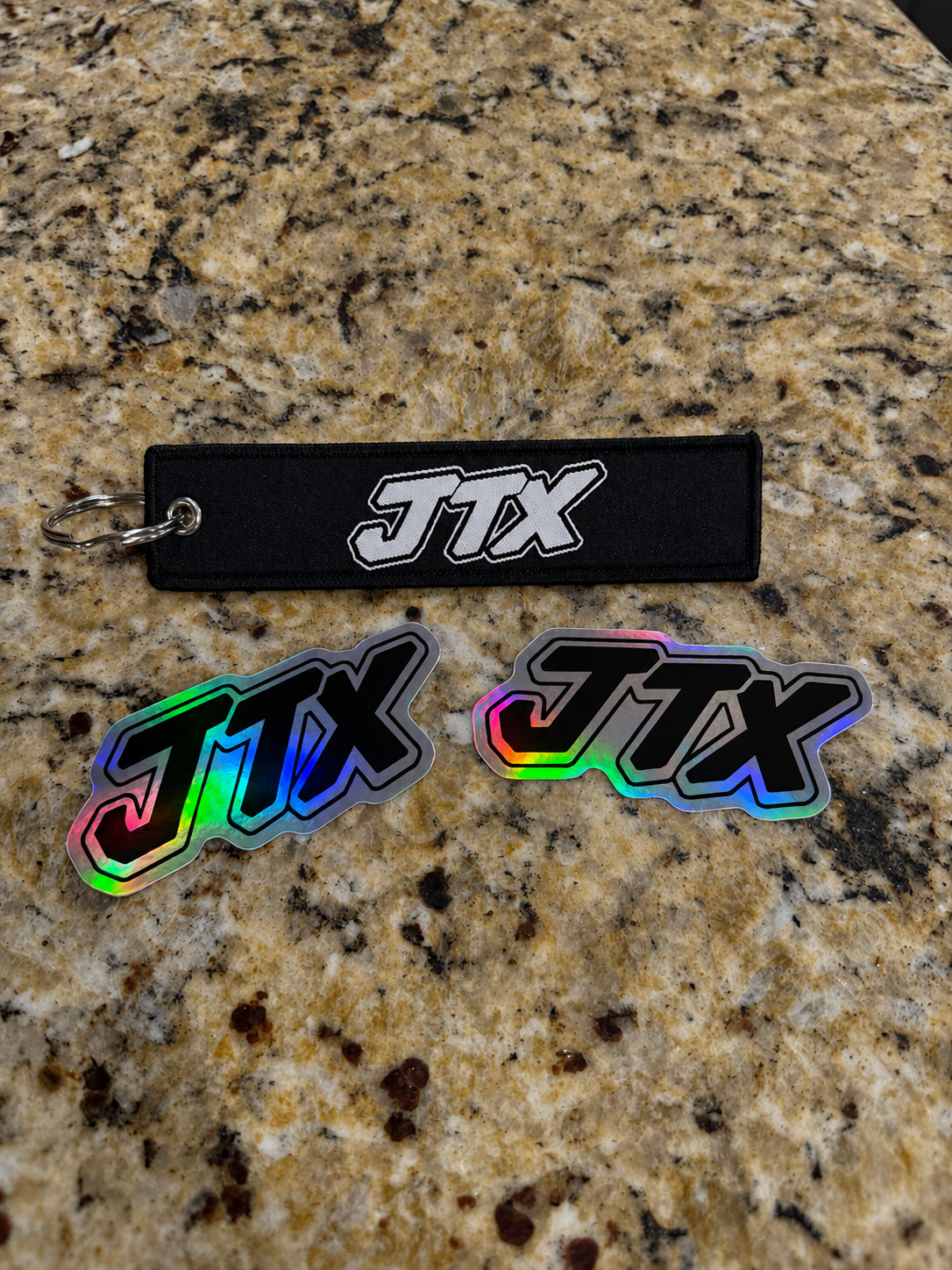 JTX keychain with stickers